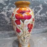 Macetas, jarrones y cuadros pintados a mano