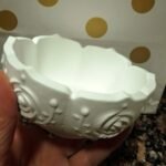 Fabricante de figuras en yeso